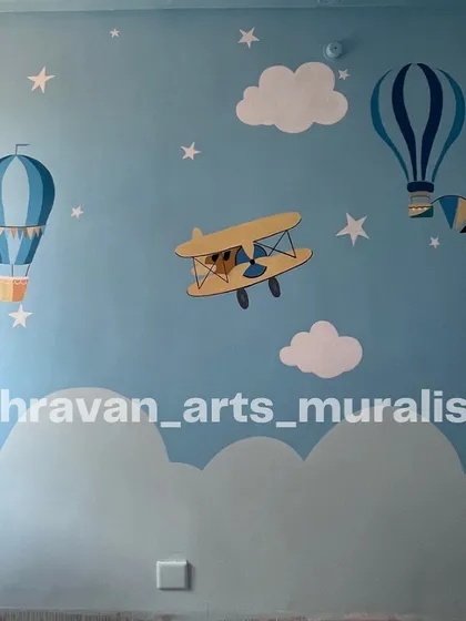 Children dream of flying high, and this mural brings that dream to life. Featuring hot air balloons and a vintage airplane among the clouds and stars, it’s a tribute to youthful aspiration.