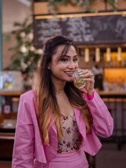 A guest sips her drink, enjoying the ambiance of the bar area. Last Saturday, the crafthouse was filled with the aroma of our new Puffizza, taking everyone on a journey of flavor.