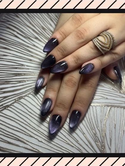 A still shot of our popular cat-eye nails, showing how the magnetic polish creates a stunning light-reflecting band across the nail.