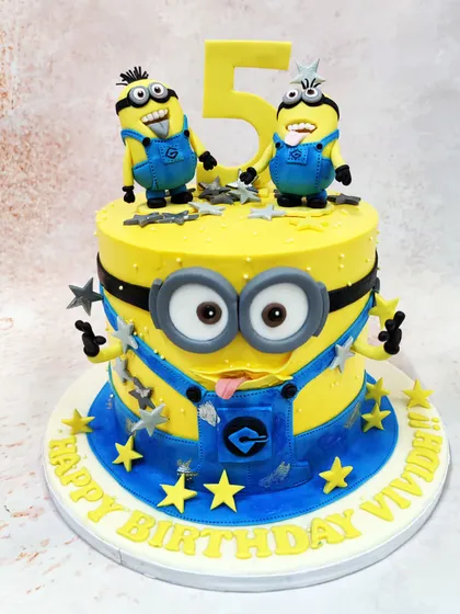 Another view of our 3D Minions Cake, showcasing the fun details and star decorations that make this design a party favorite.