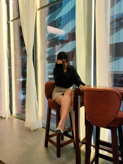 A chic and simple outfit for a cafe visit. I paired a classic black satin shirt with a beige mini skirt and black and white flats. This is a timeless look that works for many occasions.
