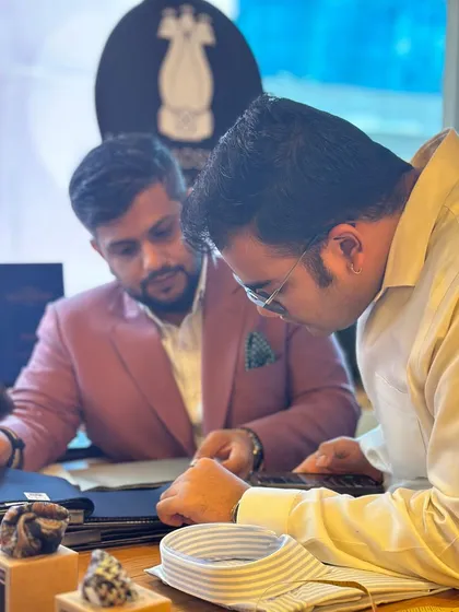 A key part of my process is the consultation. Here I am at a trunk show with 360 One Wealth, discussing how to redefine business style. It's about understanding a client's world to craft a wardrobe that is a precise and authentic extension of their professional life.