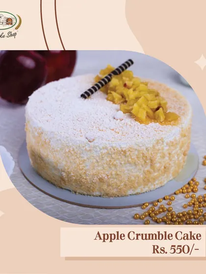 A comforting and delicious Apple Crumble Cake. It features soft, spiced apple cake with a crunchy crumble topping, perfect for a cozy celebration.
