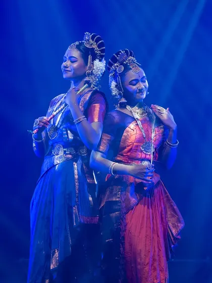 A serene moment between two dancers in "KRISHNA". The subtle expressions and gentle lighting convey the deep bond and devotion that is central to the story.
