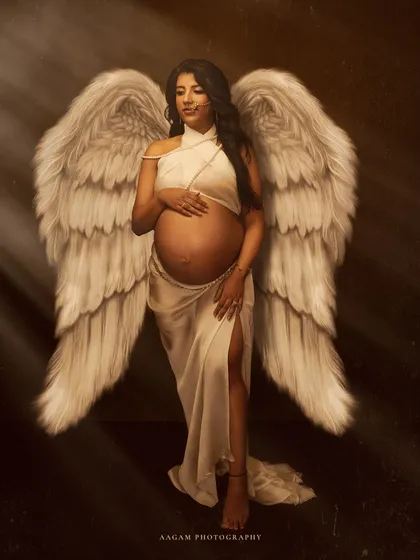 For those who want a touch of the ethereal, I create conceptual portraits like this. The angel wings symbolize the miracle of life and the protective love of a mother.