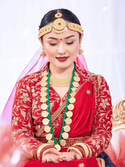 Another beautiful shot of my Nepali bride. The makeup is perfectly balanced, with a matte finish that looks incredible in photos and enhances her serene expression.