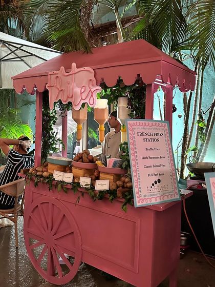 A charming pink French Fries station is a fun and whimsical addition to any event. We offer a variety of fries, including truffle, parmesan, and classic, to satisfy every craving.