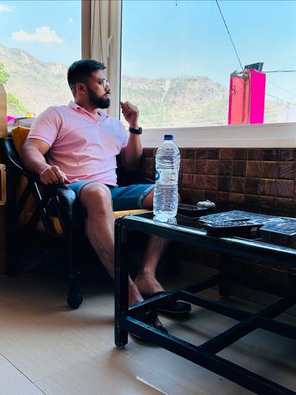 A candid shot from a workation. Even when surrounded by mountains, an advocate must be ready to attend to client messages promptly. This is the essence of our profession.