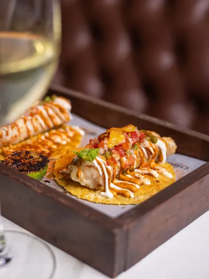 Some bites feel like sunshine. My Fish Taco is one of them, with tender fish wrapped in a warm ajwain tortilla, lifted with smoky cashew, brightened by citrus pico, and a hit of charred salsa verde. It’s a little fiesta waiting for you.
