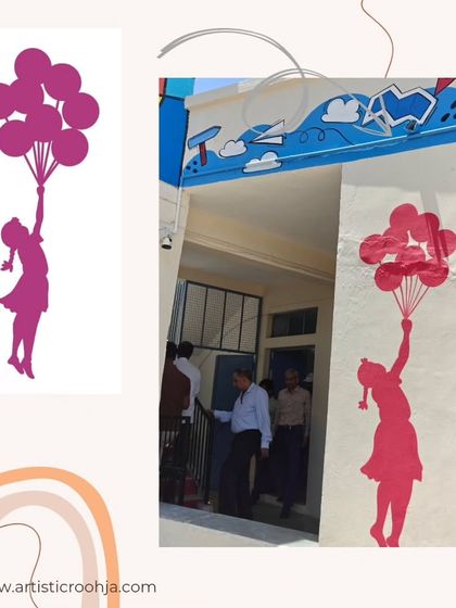 A silhouette of a girl holding balloons, a simple yet powerful image of hope and aspiration painted at a school entrance.