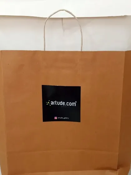 Every corporate gift is professionally packaged. Here is the pirate-themed caricature ready to be presented in our branded bag.