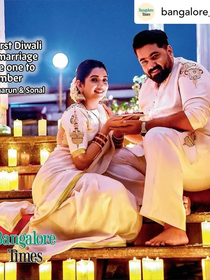 A complete look at the coordinated Diwali outfits. The hand-painted gold details on the white fabric create a look that is both traditional and elegant.
