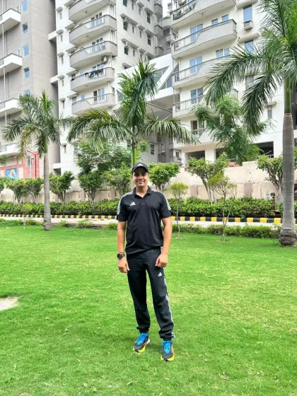 A relaxed pose in the park.