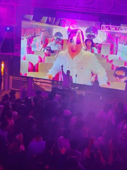 The VJ screen is my canvas. Here, a classic Bollywood scene is remixed live with my beats, creating a nostalgic yet modern feel that resonates with the crowd.