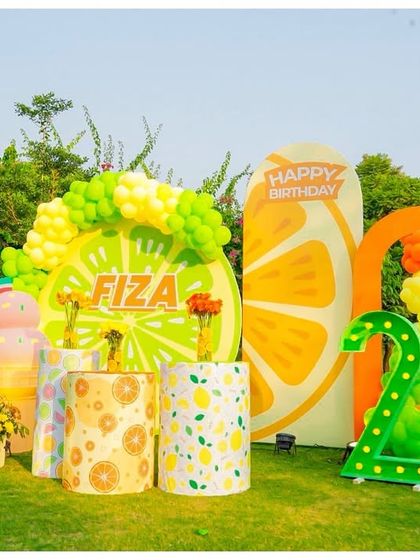 A wider view of the 'Two-tti Fruity' photo zone, showing how all the different props and backdrops come together to create a cohesive and picture-perfect setting.