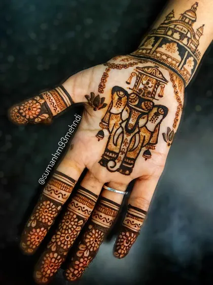 As an artist from Karnataka, celebrating our culture is special to me. This design for Mysuru Dasara features the iconic Jamboo Savari elephant and the Mysore Palace, bringing the spirit of the festival to life through henna.