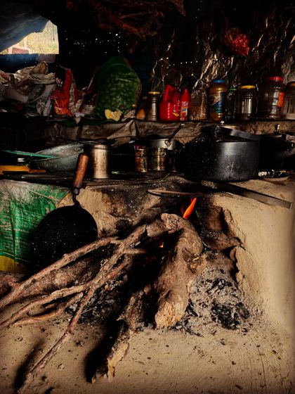 The rustic charm of a 'chulha' kitchen in the mountains. This photo captures the authentic, desi life I love to experience while traveling.