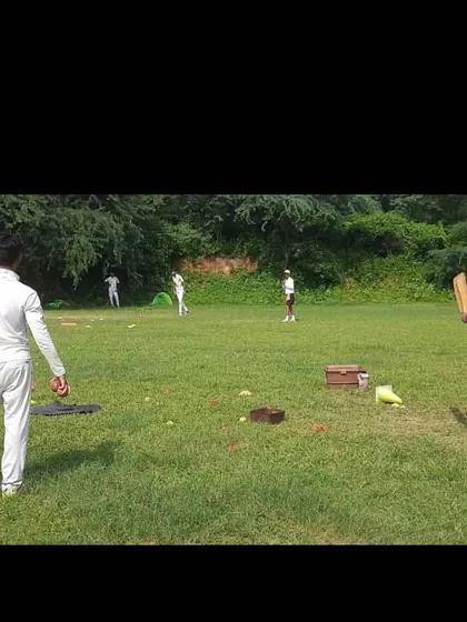 A coach uses a tennis racquet to conduct a fielding session, ensuring high-paced, repetitive catching practice. This method helps improve reflexes and hand-eye coordination for our fielders.