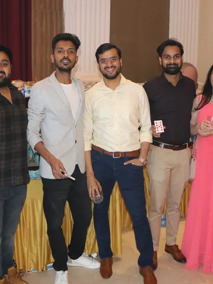 Posing with guests after a performance at an annual company party. My goal is to leave everyone with a smile and a great memory of the event.