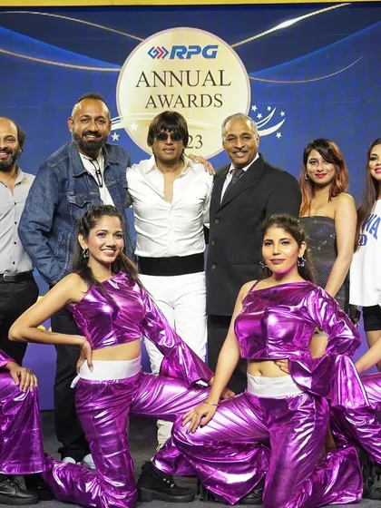 A group photo with the event organizers and my team after a successful show at the RPG Awards. It was an honor to perform for Mr. Harsh Goenka.