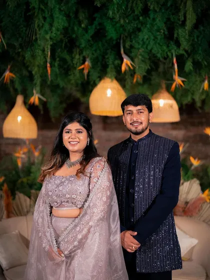 A candid moment of laughter between Yeshaswini and Shashank. We designed a boho-chic backdrop with cane lanterns and birds of paradise that perfectly matched their relaxed and happy vibe.