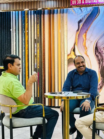 Sharing a laugh with a client. We believe in building friendly relationships, not just making a sale.