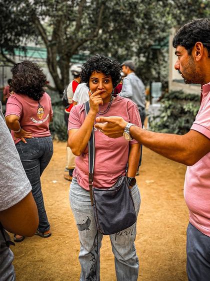 Deep in conversation at the Garage Sale. These events are the perfect opportunity to connect with fellow fitness enthusiasts.