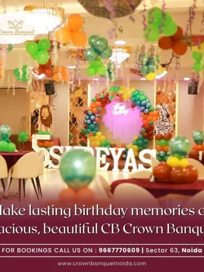 A view of our hall decorated for Shreyas's 5th birthday jungle theme. The table centerpieces and hanging decorations complement the main stage, creating a cohesive look throughout the venue.