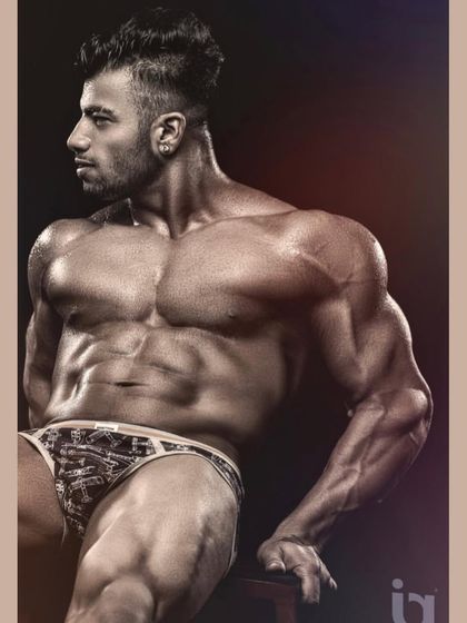 Married to the game. A professional shot that captures the dedication and lifestyle of a serious bodybuilder.