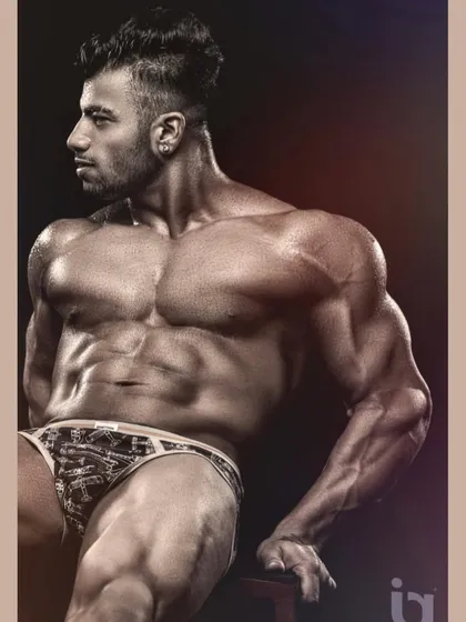 Married to the game. A professional shot that captures the dedication and lifestyle of a serious bodybuilder.