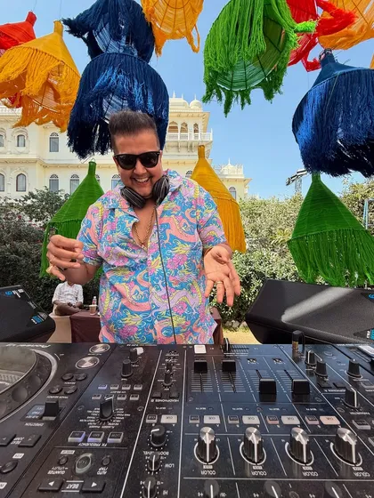 Flaunting the beats and owning the stage under the colorful decor at Hyatt Regency Jaipur. Full vibe mode, surrounded by electrifying energy.
