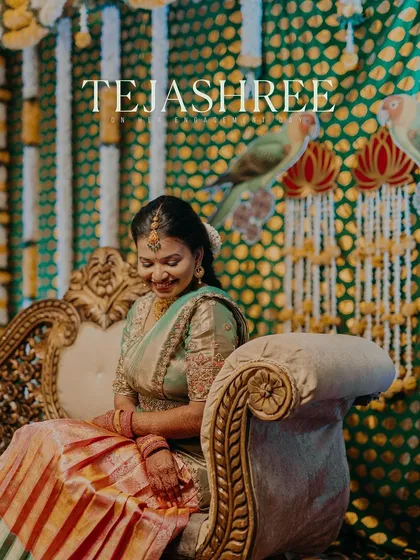 A beautiful portrait of a bride on her engagement day, dressed in a traditional half-saree.