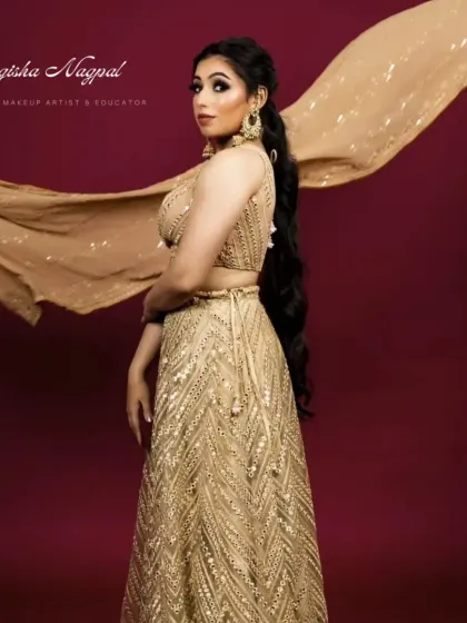 Another shot from the designer campaign, with the flowing dupatta adding movement and drama. The makeup remains flawless, enhancing the model's elegance.