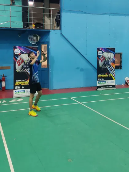 A player mid-rally, demonstrating focus and court coverage. We train our athletes to anticipate shots and maintain a strong defensive and offensive presence.
