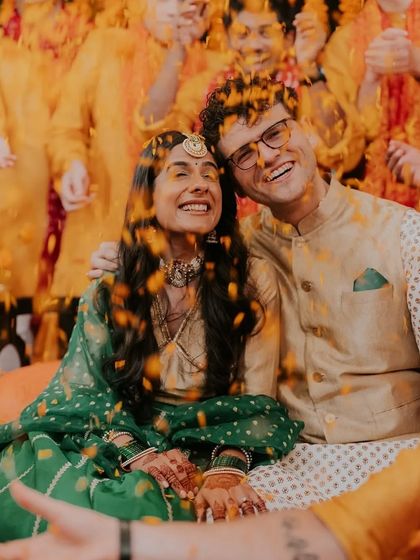 A duplicate of 301, this vibrant photo captures the pure joy of the haldi ceremony.