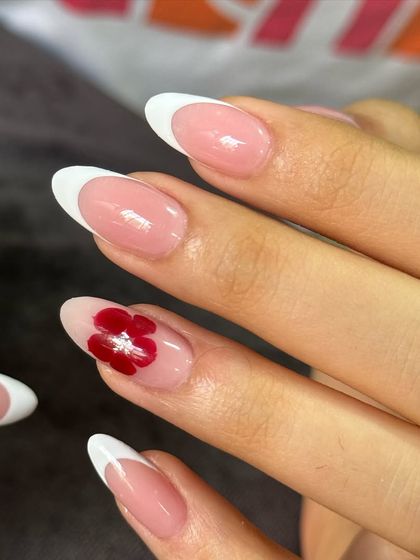 The perfect angle on this sophisticated French set. The almond shape elongates the fingers beautifully.