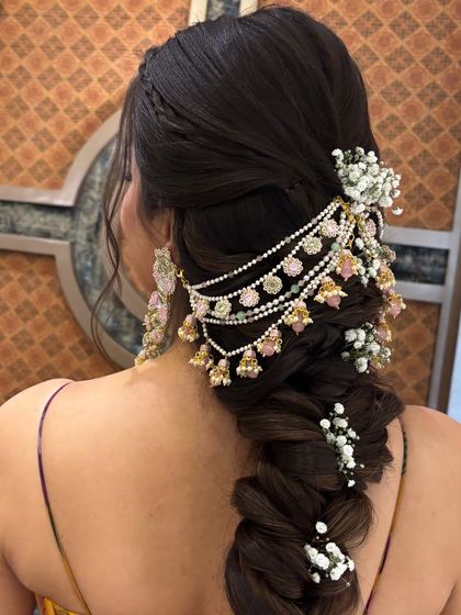 This side angle shows how the multi-layered hair jewelry drapes beautifully over the thick braid. Learning to select and place accessories is a key part of my curriculum.