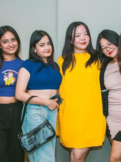 A group of friends posing for a photo.