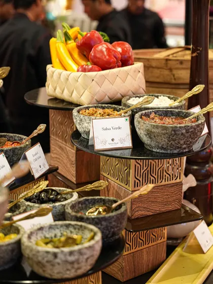 A vibrant salsa bar with a variety of freshly made salsas and toppings, allowing guests to customize their Mexican dishes.