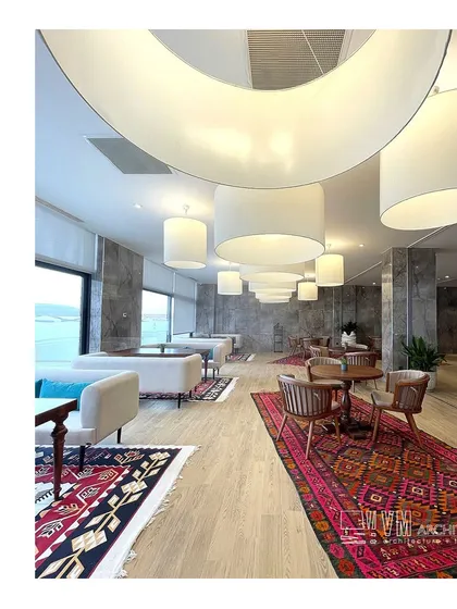 My work extends beyond India, as seen in this lounge from the Shebran Wellness Resort in Azerbaijan. The design merges modern minimalism with rich, traditional textiles, creating a sophisticated yet comfortable space for guests to relax and socialize.