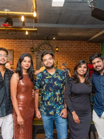 A group of friends dressed up for a night out.