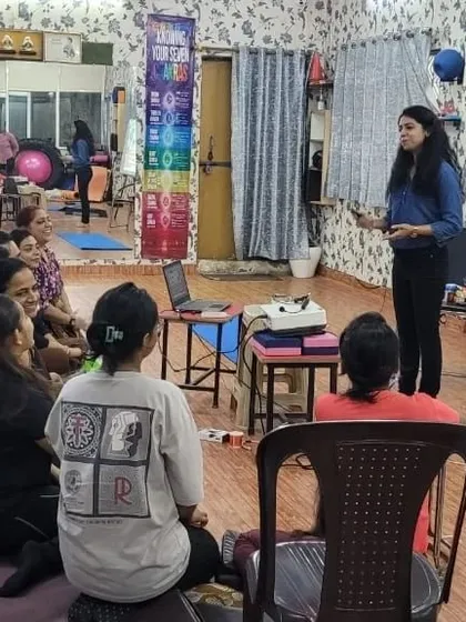 Answering questions from the trainers. These Q&A segments are crucial for clarifying doubts and ensuring the information is well understood.