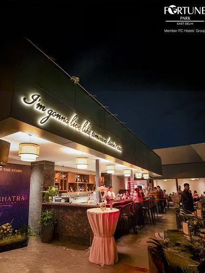 The neon sign at Nakshatra captures our philosophy: "I'm gonna live like tomorrow doesn't exist." It's a reminder to savor every moment.
