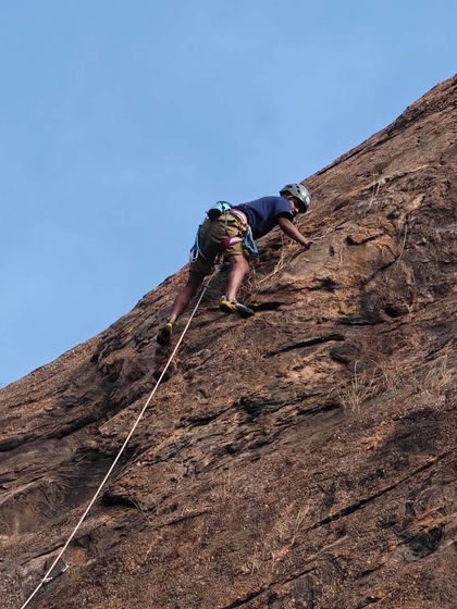Raghava making the spicy 5.10b climb 'Prema’s chapathi dough' look easy. The name itself tells you it's a route with a story.