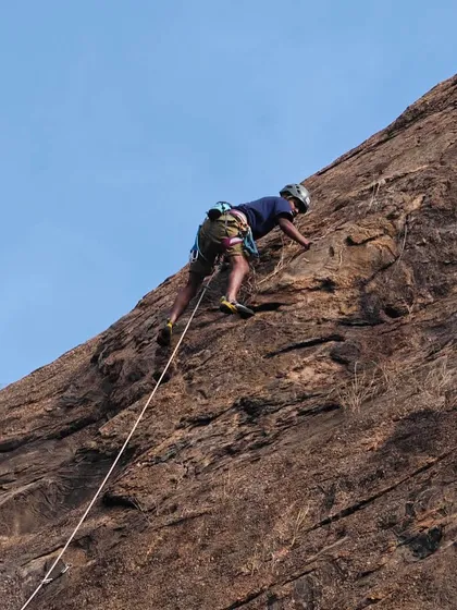 Raghava making the spicy 5.10b climb "Prema’s chapathi dough" look easy. This route is a local classic, known for its technical slab moves that test your footwork and balance.