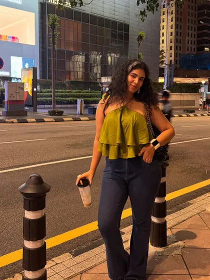 Just me, my bubble tea, and the city lights of Kuala Lumpur. A casual night-out look.