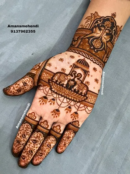 A beautiful design featuring elephants on a lotus in the center of the palm. The wrist is decorated with another pair of elephants, creating a theme of strength and prosperity.