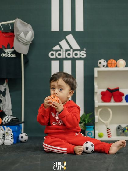 Born to play, styled by Adidas. This sports-themed shoot is perfect for active little ones, complete with a branded backdrop and mini sports equipment.