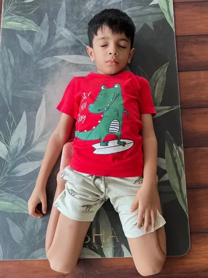 Even our littlest yogis find their moment of peace. It brings me so much joy to see children connect with their breath and discover the quiet magic of yoga in their own playful way.
