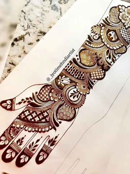 You will learn to master popular styles like this full-hand Indo-Arabic design. My course covers how to balance bold elements with intricate patterns to create a flowing, elegant composition.